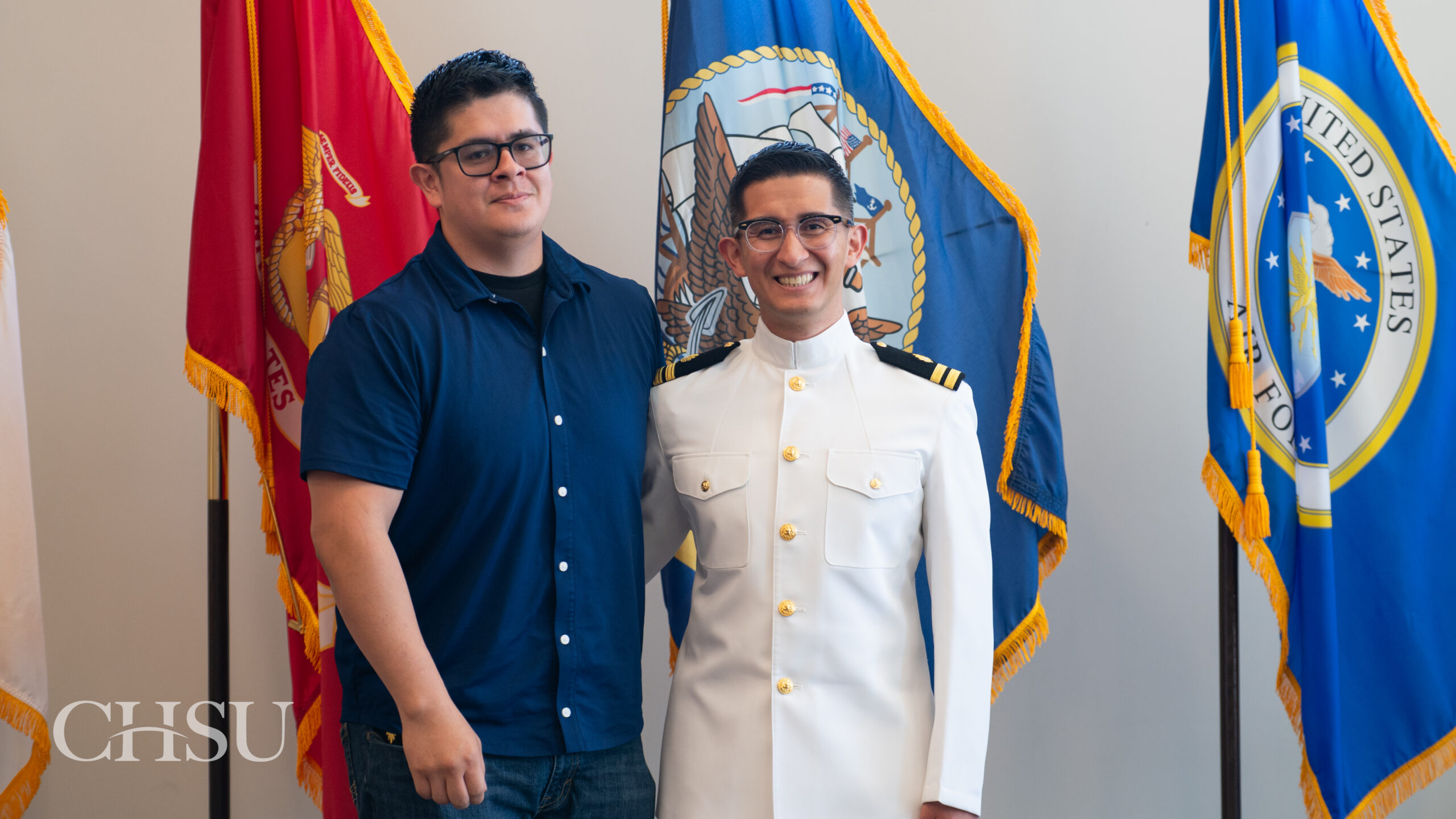 military officer medical graduate in uniform with family