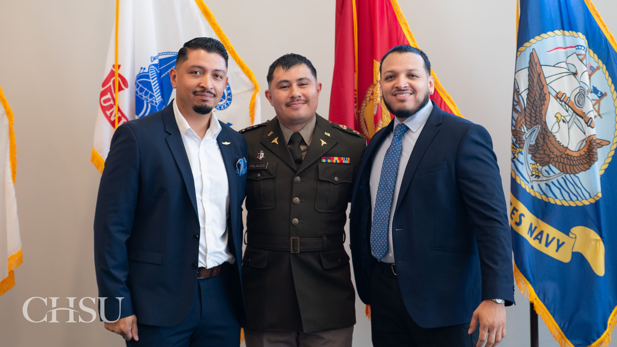military officer medical graduate in uniform with family