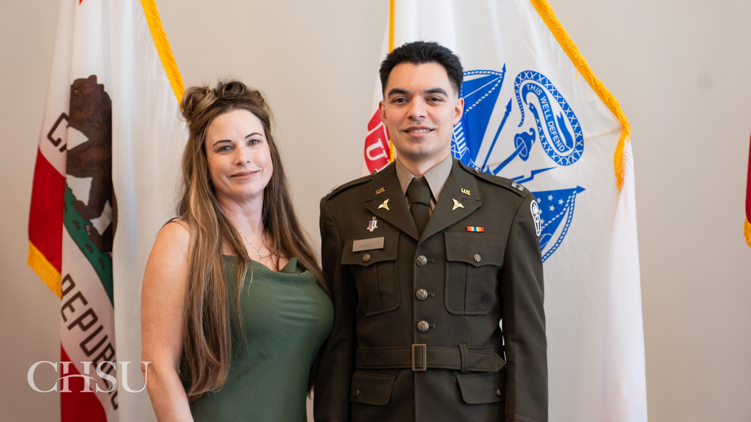 military officer medical graduate in uniform with family