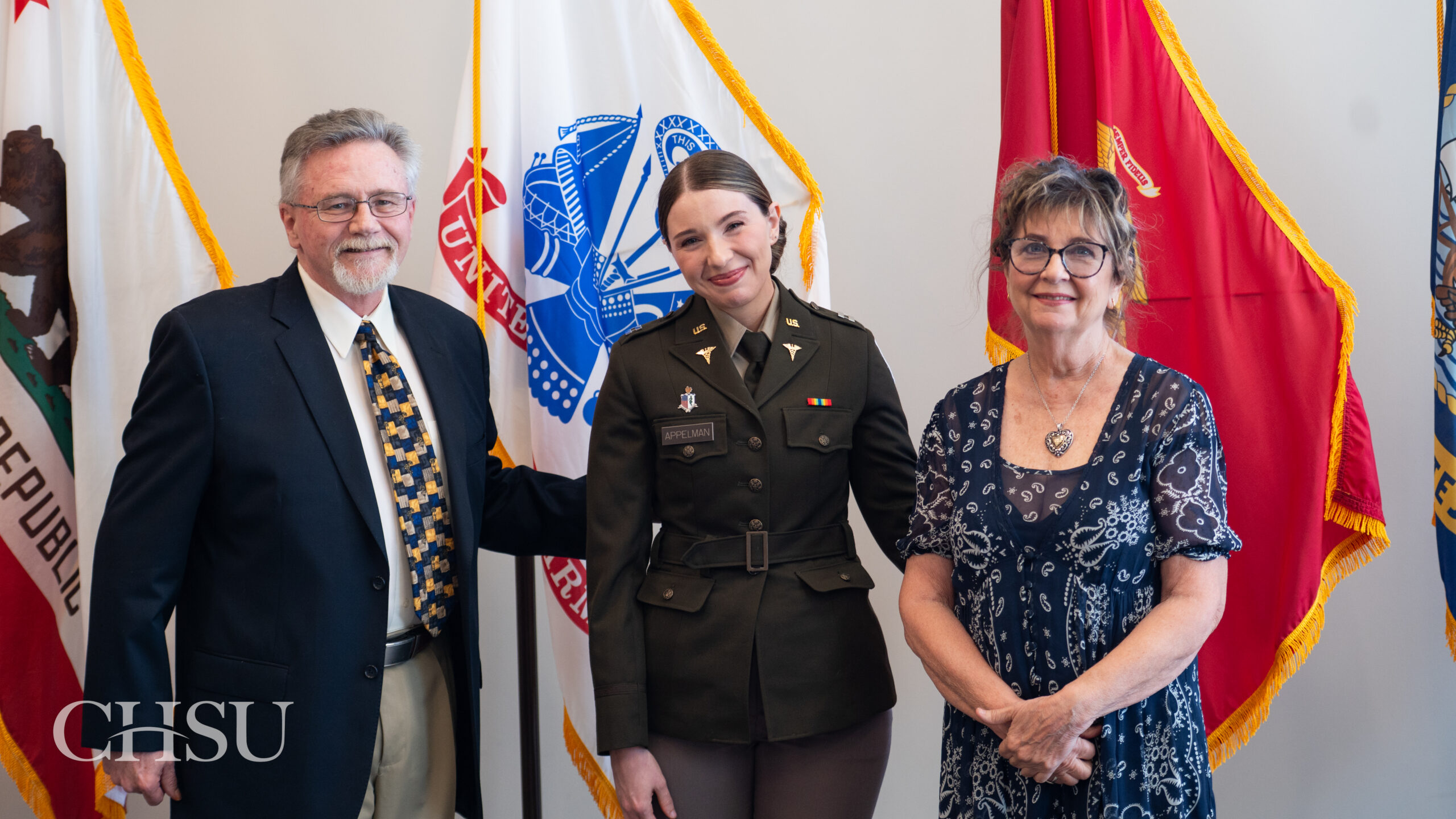 military officer medical graduate in uniform with family