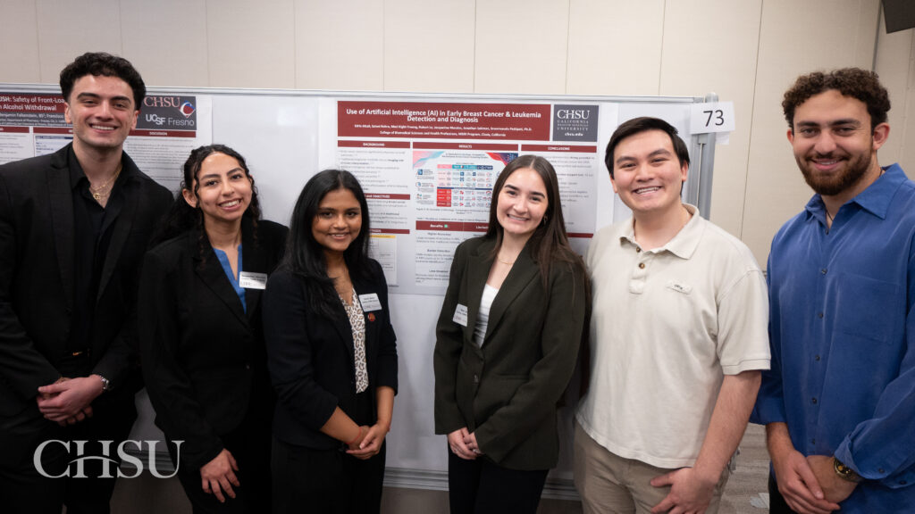 Students presenting poster at CHSU Research Day