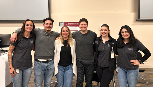 group people standing in classroom