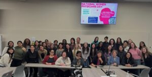 group photo of panelists and students at Women Physicians Day panel