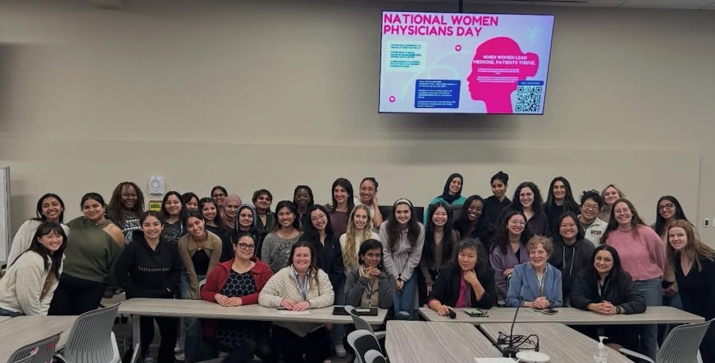 group photo of panelists and students at Women Physicians Day panel