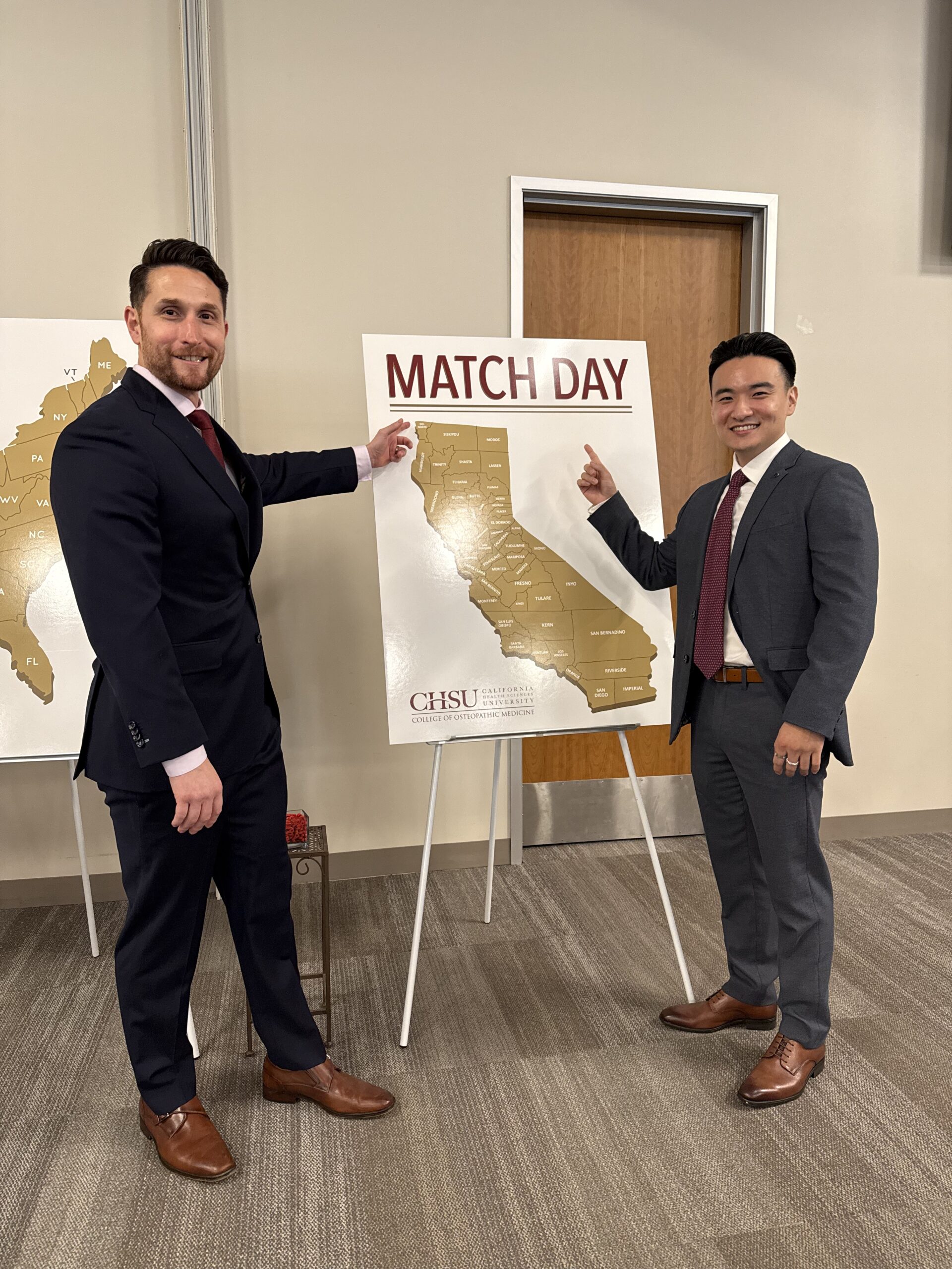 faculty and student pointing to CA match map