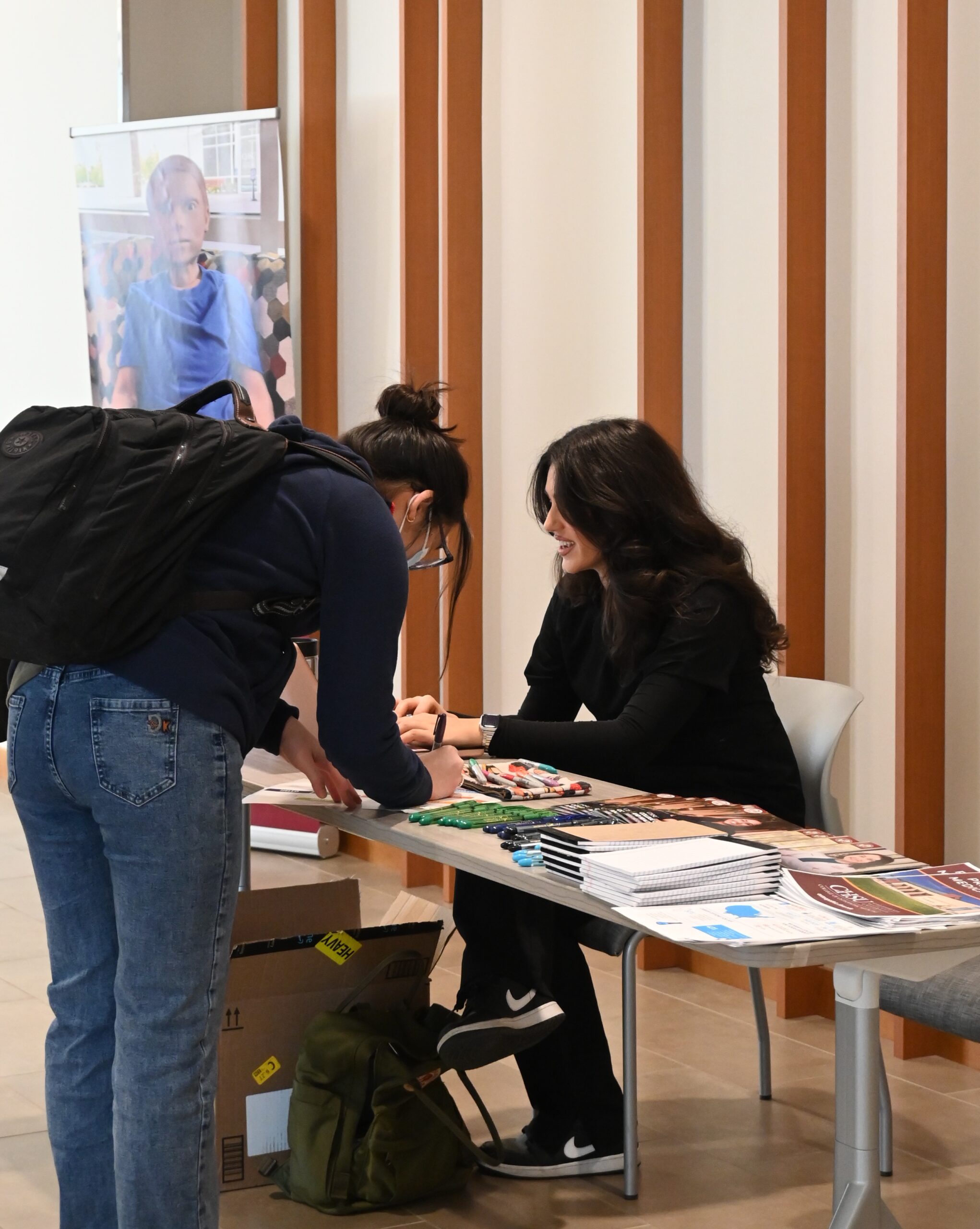 person registering at table