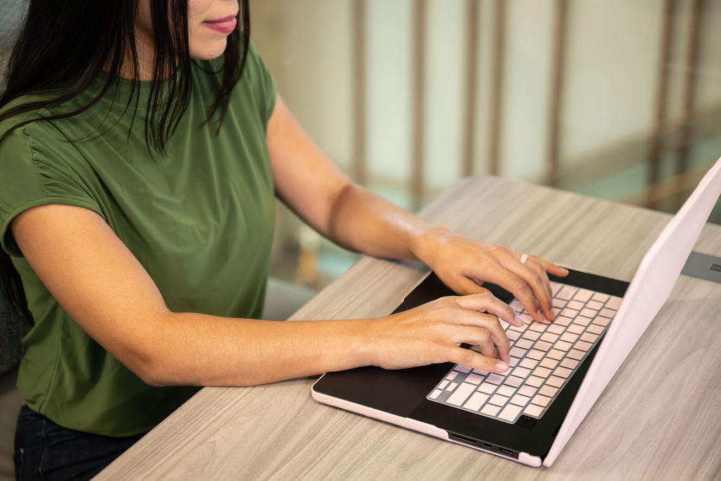 student working at laptop