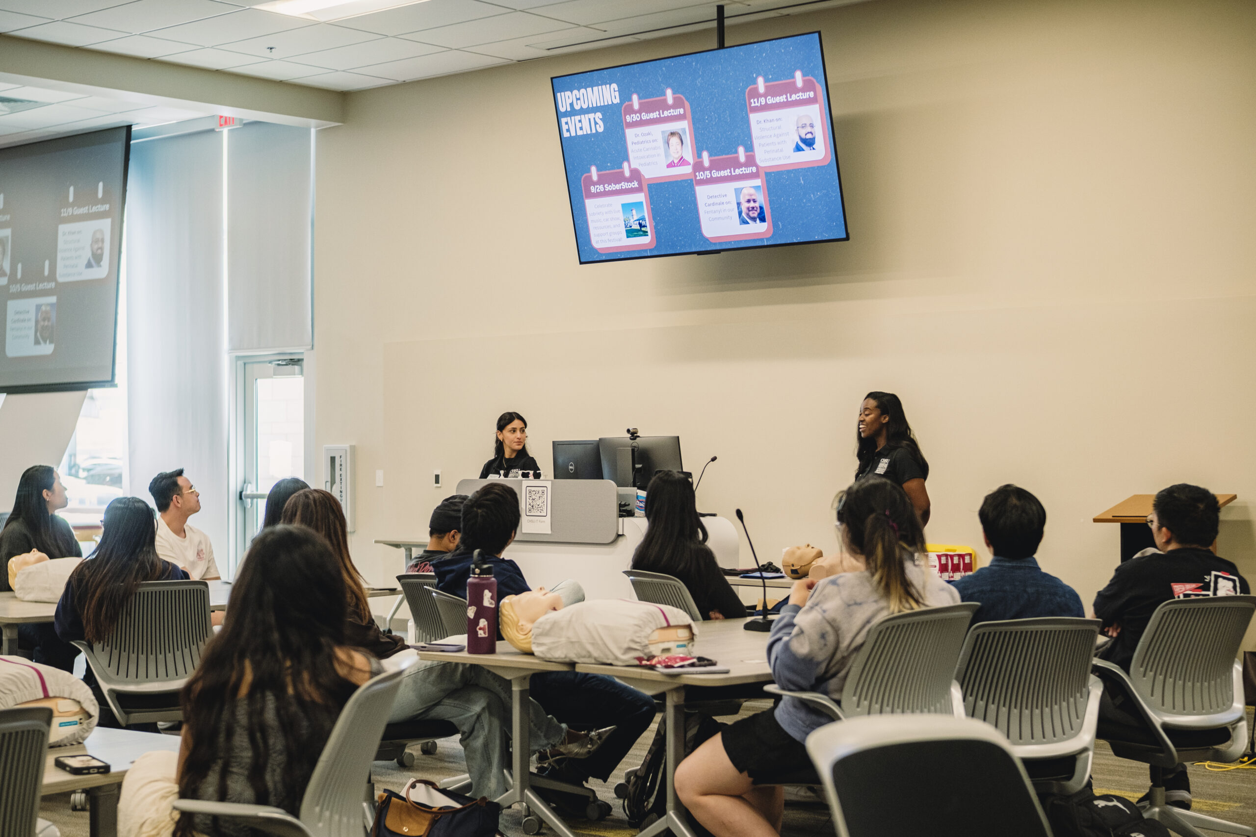2 CHSU Student presenting to their peers about OPC