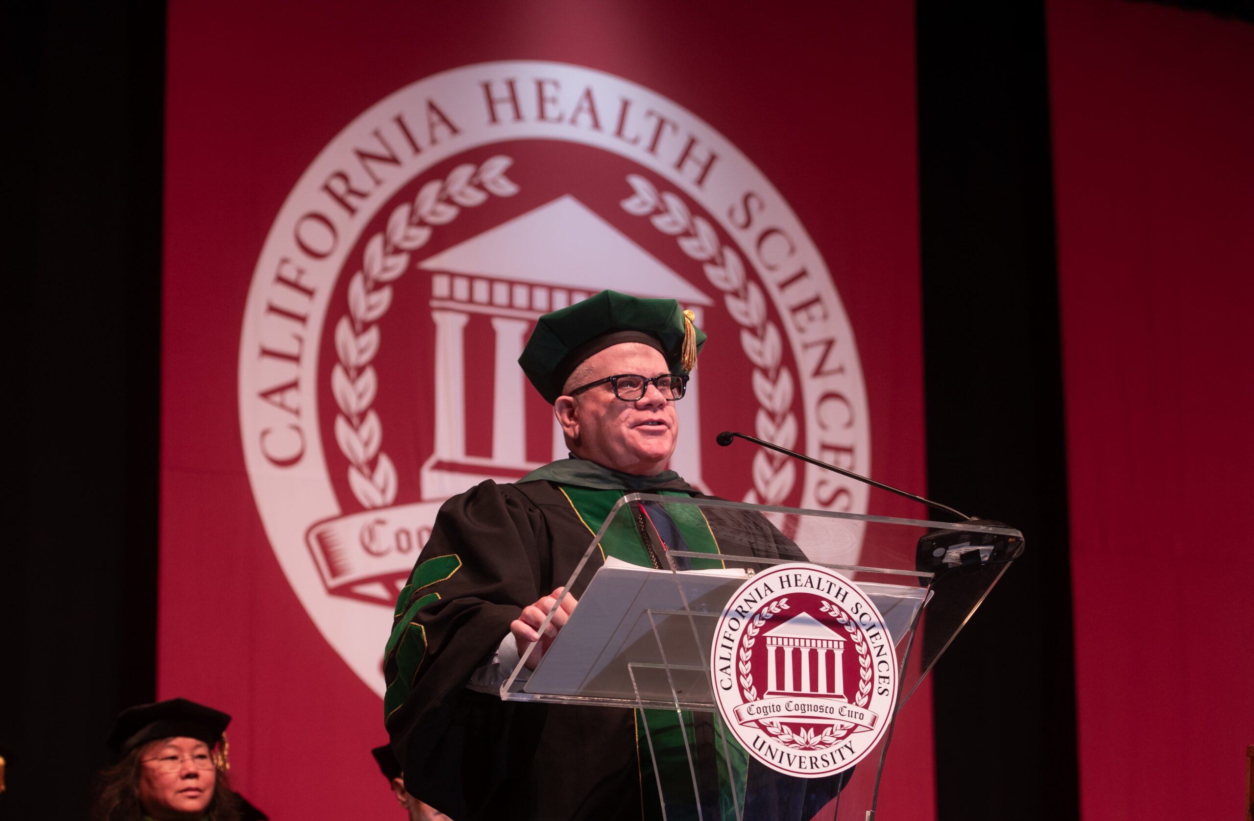 Dean commencement podium College of Osteopathic Medicine