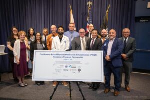 group of representatives from seven organizations supporting PM&R Residency program