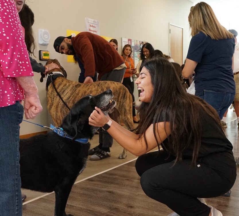 Female student with therapy dog